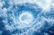 © Birzhan - Circular hole in blue sky with clouds.