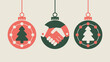 © Abdul - Three christmas ornaments with trees and handshake design hanging against a neutral background color