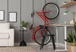 © New Africa - Red bicycle and stylish furniture near grey wall indoors