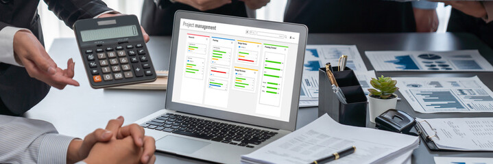 Wall Mural - Project planning software for brisk business project management on the computer screen showing timeline chart of the team project