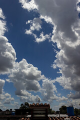Wall Mural - Blue sky background with white clouds. Cumulus white clouds in the blue sky.