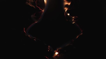Burning paper, glowing edge of paper on a black background. Mockup for your logo. Wide angle horizontal wallpaper or web banner. flame effects for overlay designs or screen blending mode to make high.