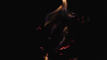 Burning paper, glowing edge of paper on a black background. Mockup for your logo. Wide angle horizontal wallpaper or web banner. flame effects for overlay designs or screen blending mode to make high.