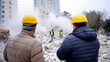 © Innese - Construction workers monitor demolition activity at a building site in a busy urban area