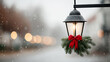 © sabyna75 - Winter lantern with red bow wreath and gentle snowfall for festive holiday decor