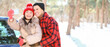 © Pixel-Shot - Happy couple taking selfie near car on winter day