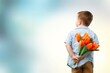 © BillionPhotos.com - Child with beautiful bouquet of tulips. Women's Day.