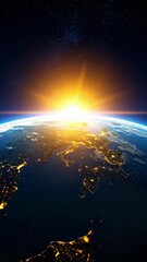 Wall Mural - Dramatic sunrise over planet earth from space with city lights visible from orbit and beautiful starfield