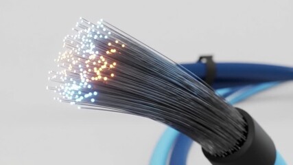 Macro Shot of Fiber Optic Cable With Blue and Yellow Light