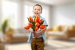 © BillionPhotos.com - Child with beautiful bouquet of tulips. Women's Day.