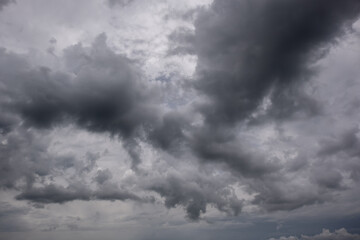 Wall Mural - dark sky with stormy clouds. dramatic sky rain,dark clouds before a thunder-storm,clouds before rain