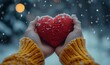 © Sameer Iyer - Hands holding a knitted red heart against a snowy background, symbolizing love, warmth, and friendship. The image evokes the feelings of care and emotional support during the winter, Generative AI