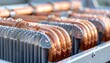© Graphicfresh - Copper coils with water droplets, condensation, refrigeration, and cooling system details in closeup macro industrial manufacturing environment.