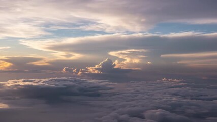 Wall Mural - A dynamic cloudscape unfolds with dramatic formations and shifting light, filling the entire sky evolution, shifting light, dramatic formations