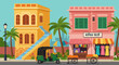 © Design - Vibrant indian street scene with colorful buildings and an auto rickshaw passing by