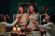 © Zamrznuti tonovi - Friends toasting during thanksgiving dinner celebrating with wine and roasted turkey
