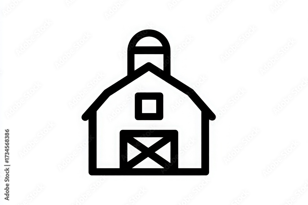 A barn stands with a classic shape, showcasing a tall roof and large front doors. Its simple design is characteristic of rural landscapes, representing farm life and agricultural practices.