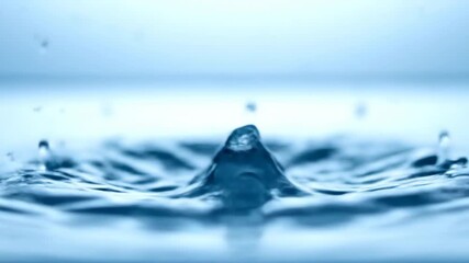 Wall Mural - Soft, diffused light illuminates a gentle slow motion water splash, showing intricate patterns as liquid softly impacts a calm surface gentle slow motion water splash, liquid softly impacts, aqua