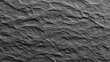 © Kumbara - Textured gray slate stone surface with rough edges and natural patterns