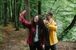 © dsheremeta - Father daughter taking funny selfie in forest