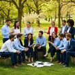 © atex - Business Team Collaborating Outdoors on a Sunny Day
