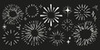 © Alena creator - Pencil crayon draw fireworks, sunburst, spark set in sketchy chalkboard style. Minimalist kids drawing black and white doodles burst elements for festive design.