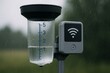 © Faziljan - Rain gauge with a smart sensor tracks precipitation outdoors. Modern weather monitoring technology collects essential data.