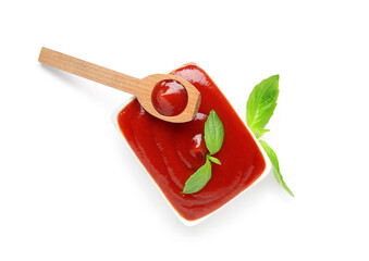 Wall Mural - Bowl and spoon with tasty ketchup isolated on white background