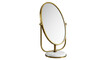 © Adrian - Elegant gold vanity mirror isolated, oval shape with marble base for makeup and grooming on a clean backdrop