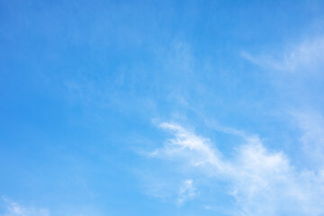 Wall Mural - fantastic soft white clouds against blue sky and copy space horizontal shape. web banner.website hea