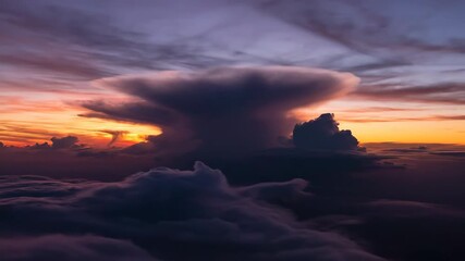 Wall Mural - intense vibrant cloud formations develop and shift dramatically across a wide, colorful afternoon sk