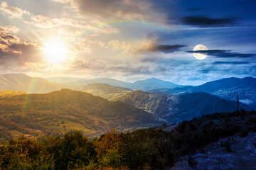 Wall Mural - autumn equinox landscape in mountains. beautiful view of countryside. day and night time change concept. alps in the background. cloudy sky. picturesque rural scenery with village with sun and moon
