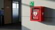 © Cliff - Automated external defibrillator (AED) hanging on the wall in an office building, concept of first aid, heart attack, healthcare
