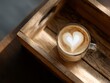 © LuDo - In a softly lit setting, a dark wooden tray holds an artisan coffee cup featuring intricate designs made from latte art
