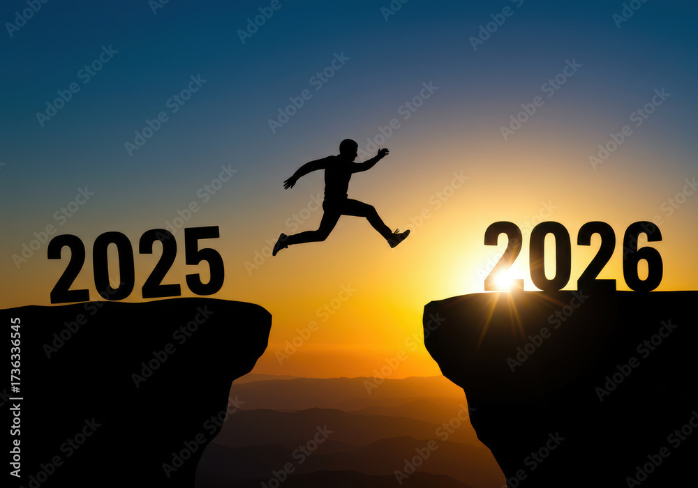 Silhouette of person jumping from 2025 cliff to 2026 during sunset ...