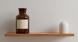 © ThanhLuan - 갈색 약병과 흰색 오브제, 나무 선반 위에 놓인 정물 사진, 미니멀리즘 강조