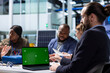 © DC Studio - Factory investor uses green screen laptop, examining financial statements before investing. Compliance officer using chroma key notebook to assess compliance with regulations, employed by shareholders