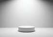© motion-max - Clean white pedestal under spotlight perfect for product displays and presentations