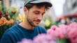 © iuricazac - Man at flower shop.
