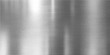 © PIXEL RISE - Shiny silver brushed metal texture on an industrial aluminum plate surface for a sleek stainless steel background pattern