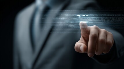 A man in a suit is pointing at a screen with a blue line