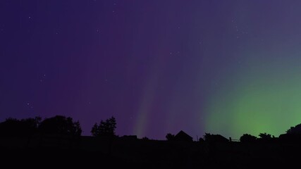 Wall Mural - Aurora borealis, polar lights with Milky Way stars. Time-lapse video..	
