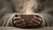 © Lara - Warm hands holding a steaming bowl on a wooden table