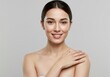 © Alper - Smiling woman with flawless skin poses for a beauty portrait.
