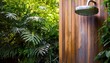 © Laura - rustic wooden outdoor shower lush green foliage backdrop garden shower relaxation