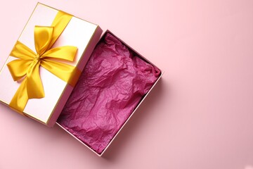 Wall Mural - Open gift box with beautiful lid on pink background, top view. Space for text