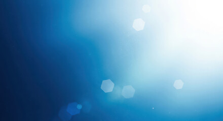 Abstract blue gradient with soft light bokeh effects