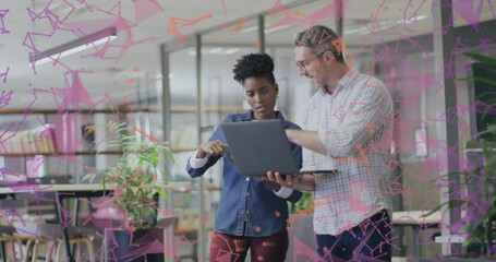 Wall Mural - Woman swiping trackpad and colleague highlighting chart while overlay pulsing for business analysis