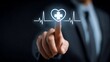 © mbah - Businessman touching a heart-shaped symbol showing health, with a healthcare wave, dark background, for medical concept