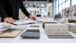 © Fahroni - Designer selecting healthy interior materials inside modern showroom where sustainable textures, finishes, and furnishings are chosen to enhance wellness and improve indoor living environments.